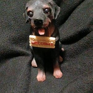 Dog Figurine Toy with Yellow 'Welcome' Sign - Black and Brown